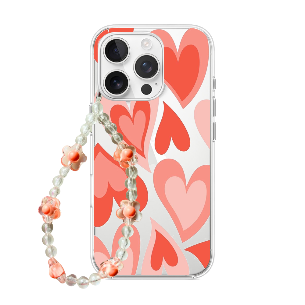 Clear phone case featuring retro layered hearts in peach and coral tones, with a matching beaded flower wrist charm
